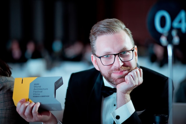 person holding the award