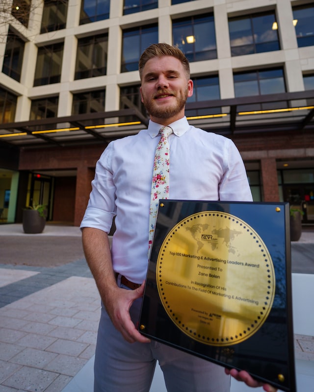person with big award